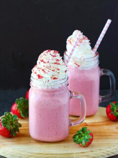 Strawberry Coconut Shake dressed up with whipped cream frosting