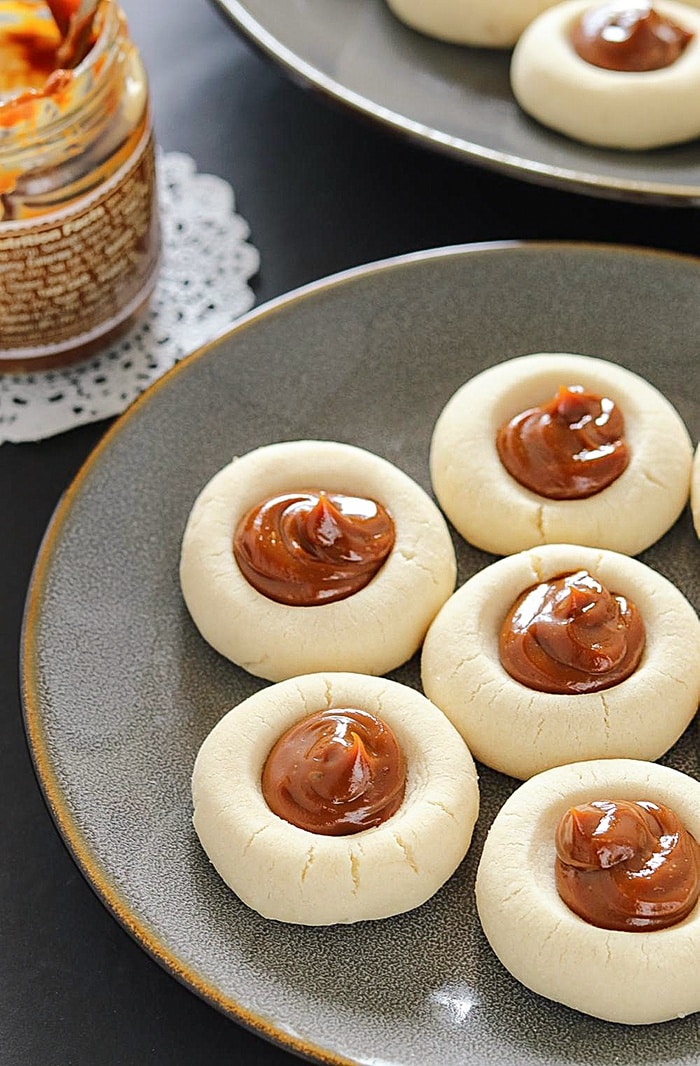 Thumbprint cookies filled with Dulce De Leche spread