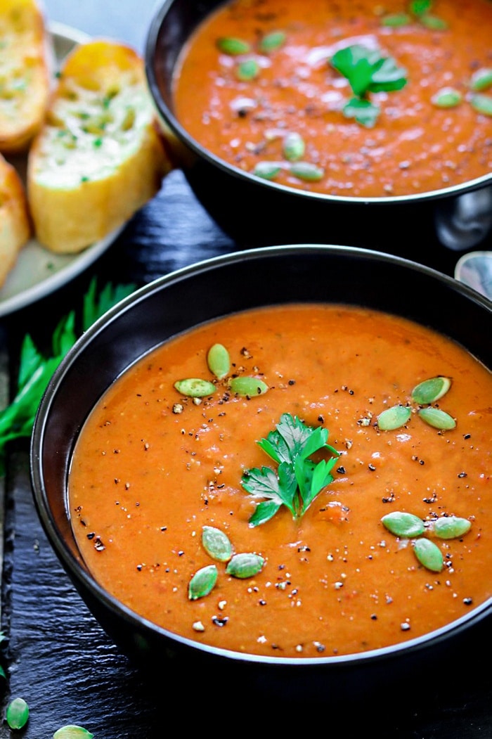 Instant Pot Roasted Red Bell Pepper And Lentil Soup studded with pumpkin seeds