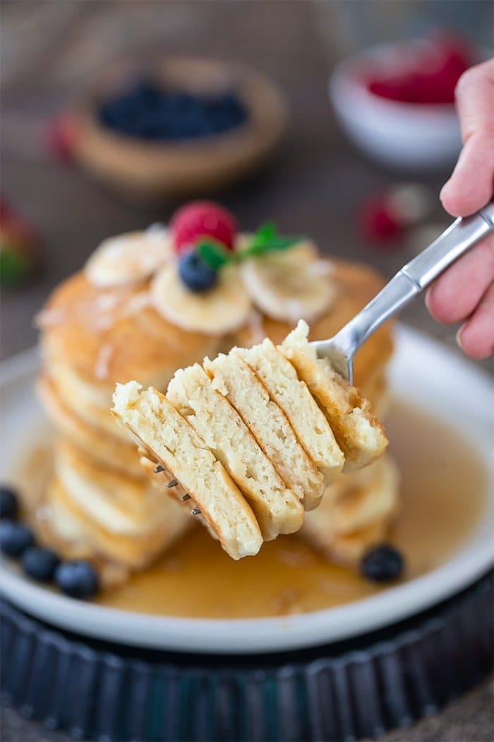 Vegan banana pancakes on a fork