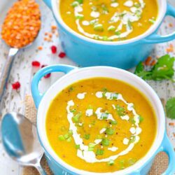 Roasted Butternut Squash and Lentil Soup in bowls garnished with scallions