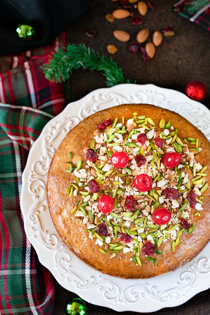 Spiced fruit and nut cake garnished with toasted nuts